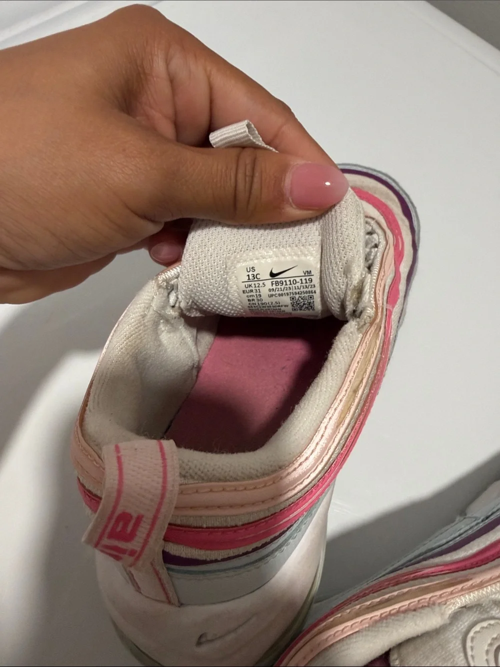 Nike Kids White Sneakers with Pink and Purple Wave Accents